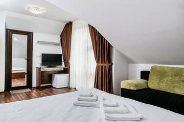 Фото номера Семейный номер с балконом Гостевой дом Guest House Byalata Kashta г. Златоград 5