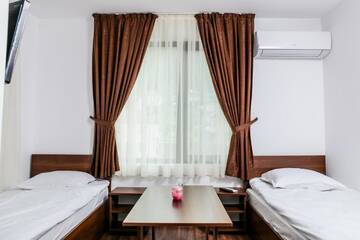 Фото номера Двухместный номер с 2 отдельными кроватями Гостевой дом Guest House Byalata Kashta г. Златоград 2